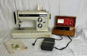 lot 90 image: Kenmore Model 1913 Zig Zag Sewing Machine with accessories