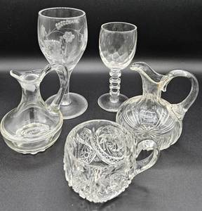 lot 98 image: Misc Lot of Uranium Glass -7 pieces total -  3 Teacups, 2 Stemware, 2 Cruets