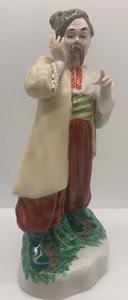lot 56 image: Vintage SOVIET UKRAINIAN Porcelain Figurine - Man Karas - KIEV PORCELAIN ART FACTORY