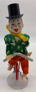 lot 65 image: Vintage Western Germany CLOWN Toy on Unicycle