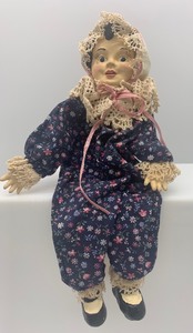 lot 180 image: VINTAGE Ceramic Block Girl