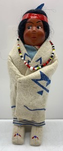 lot 229 image: Vintage SKOOKUM Bully Good Small Native American Indian Doll