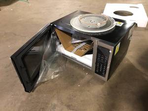 lot 21 image: Vissani 1.5 cu. ft. Countertop Convection Microwave in Fingerprint Resistant Stainless Steel with Air Fryer and Sensor cooking  Customer Returns See Pictures