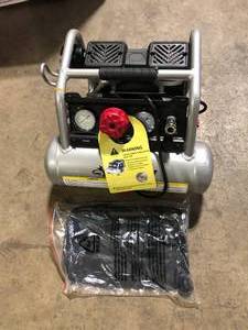 lot 27 image: Husky 1 Gal. 135 PSI Portable Electric Quiet Air Compressor   Customer Returns See Pictures