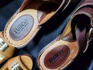 lot 286 image: Assorted Stylish Footwear Collection Including Born, Michael Kors, and Red Wing Shoes