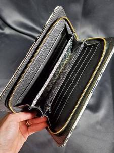 lot 316 image: Michael Kors Wallet with Newsprint Design