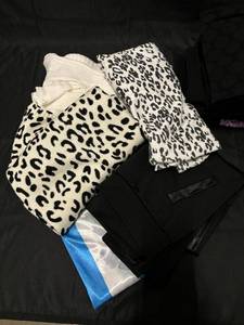 lot 523 image: Assorted Womens Apparel Lot - Includes Sweaters, Pants, and Tops