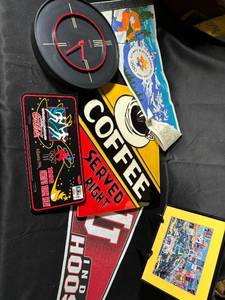 lot 585 image: Assorted Memorabilia Lot with Wall Clock, Vintage Signs, and Pennants