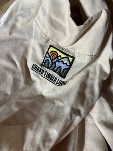 lot 597 image: Grand Timber Lodge Beige Bathrobe