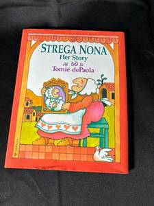 lot 754 image: Lot of Music CDs & Strega Nona Storybook