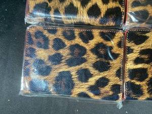 lot 648 image: Lot of 9 Leopard Print Wallets