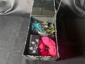 lot 672 image: Assorted Decorative Jewelry and Wine Stoppers in Elegant Box