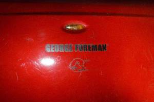 lot 11 image: George Foreman Grilling Machine Model GRV120R