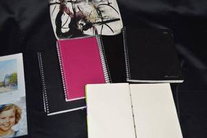 lot 32 image: Assorted Lot of DVDs, Notebooks, and Art Prints