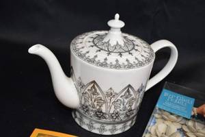 lot 75 image: Assorted Household Items Lot Including Teapot, Bowls, Books, and More