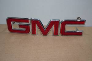 lot 190 image: Red & Chrome GMC Emblem