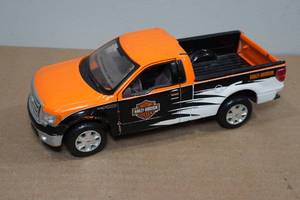 lot 209 image: Harley Davidson Die Cast Ford Truck
