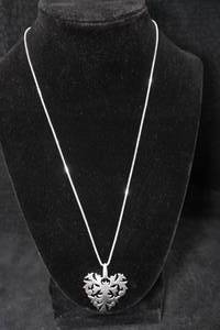lot 295 image: Intricate Sterling Silver Pendant with Chain