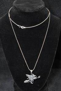 lot 303 image: Sterling Silver Witch on Broom Pendant with Beaded Chain