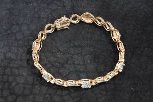 lot 314 image: Gold Plated Sterling Silver Aquamarine Tennis Bracelet