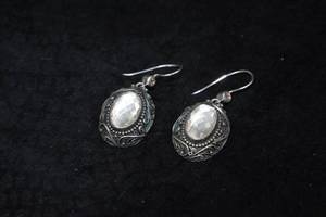 lot 325 image: Sterling Silver Dangle Earrings with Silver Stone