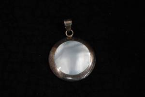 lot 329 image: Sterling Silver Pendant with Bezel Set Light Blue Stone