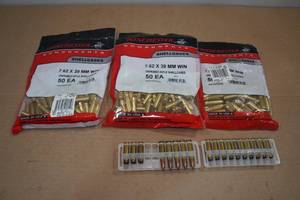 lot 165 image: 163 Empty 7.62 x 39mm Casings and Ammo