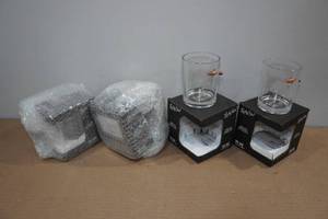 lot 188 image: Lucky Shot Rocks Glasses with Embedded Bullets
