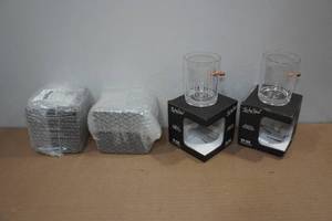lot 192 image: Lucky Shot Rocks Glasses with Embedded Bullets