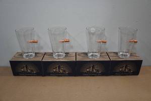 lot 193 image: Pint Glasses with Embedded Bullets