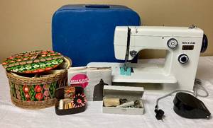 lot 42 image: Riccar Europa 1288 Sewing Machine, Sewing Basket and Accessories