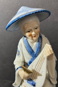Two Vintage Asian Figurines