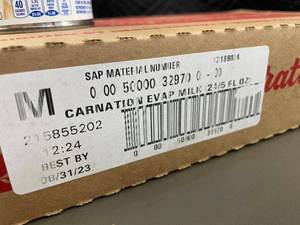 lot 311 image: Nestl Carnation Evaporated Milk - Case of 24 Cans