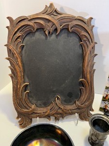 lot 53 image: Syrocco Wood Frame, Carnival Glass Dish, Dutch Windmill Tile, Carved Marble Candlestick & More