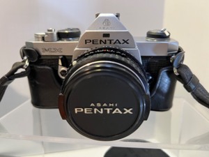 lot 63 image: Pentax MX Manual Focus Camera in Chrome or Black Optional 50mm Lens & More