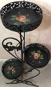 lot 74 image: Three Tiered Black Metal Folding TOLEWARE Plant Stand with Flowers