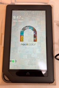 lot 122 image: Barnes & Noble NOOK COLOR Powers On Comes W Case & Accessories