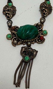 lot 224 image: Antique Vintage Jewelry Including an Ornate GRIFFON  GARGOYLE Necklace, Gold Filled Foral Charm, Filigree Brooch Pin & Locket Piece