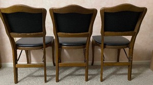 lot 256 image: Vintage Traditional Style Wood and Black Upholstered STAKMORE Folding Chairs-QTY 3