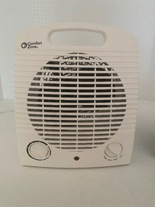 lot 262 image: Two Compact Space Heaters Including Comfort Zone and VINTAGE METAL Crest Neat Heat