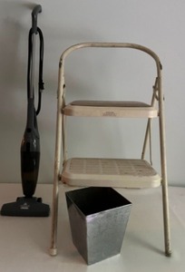 lot 287 image: Household Items Including a BISSEL Featherweight Stick Vacuum, Folding Step Stool & Cast Metal Wastebasket