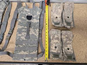 2 ACU hydration Carrier Pack (bladders not included) and 2 Blackhawk S.T.R.I.K.E Gen IV ACU tactical double mag pouches (holds 6 mags each)