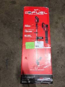 Milwaukee M18 FUEL 18V Lithium-Ion Brushless Cordless QUIK-LOK String TrimmerBlower Combo Kit with Battery & Charger (2-Tool) Customer Returns See Pictures