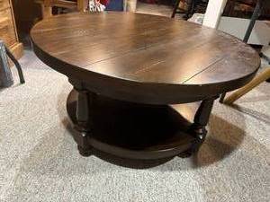 lot 1 image: Two tier solid wood coffeeoccasional table