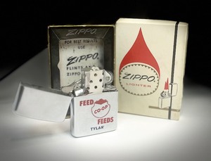 lot 50 image: Vintage Zippo Feed Co-op Feeds Tylan Lighter wBox