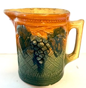 lot 45 image: Antique Grape Pottery Pitcher