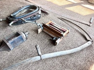 lot 226 image: Antique Two Man Logging Saw, Horse Collar, Clothes Wringer, Wall Light and Scythe