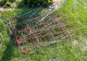 lot 219 image: Tomato Cages, Chicken Wire and Misc. Garden Supplies