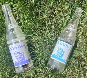 lot 225 image: Vintage 1960s Minnesota Vikings Beverages Soda Bottles and Bottle Holder Tray