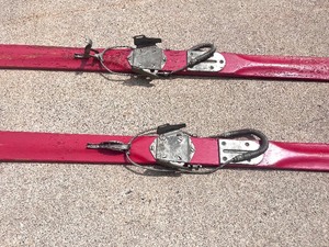 lot 214 image: Vintage Red Painted Wood Skis